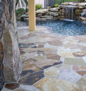 Flagstone deck and rock wall