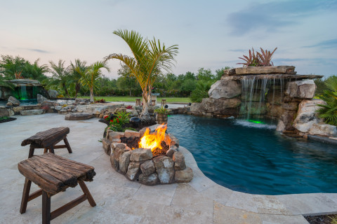 Seating area at Fire Pit and Mai Pool with Stream and Therapy Pool beyond