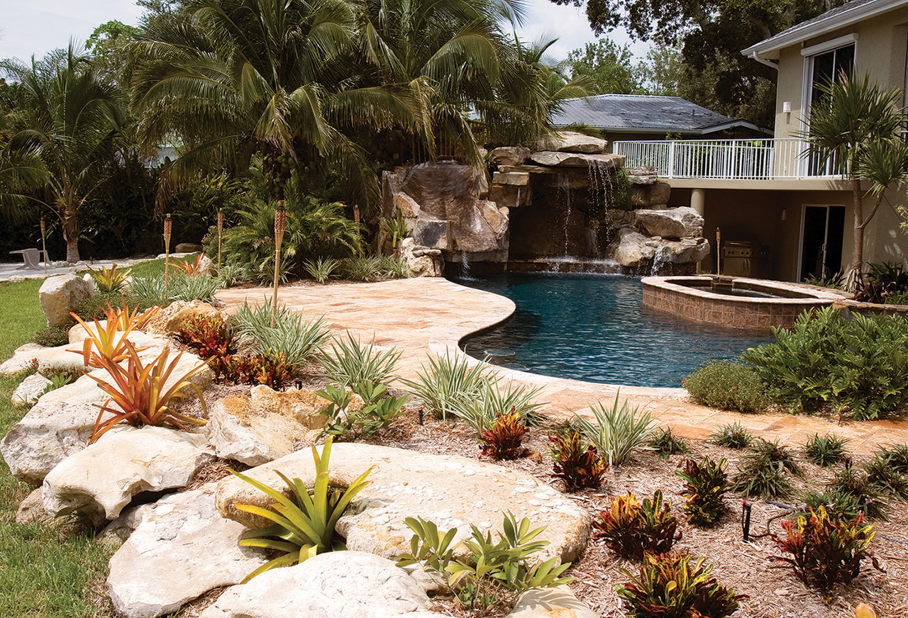 Custom Swimming Pool with Natural Stone Waterfalls and ...