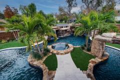 Signature Series Insane Pool with massive grotto and spa island Signature Series Insane Pool with massive grotto and spa island