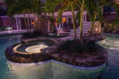 Signature Series Insane Pool with spa at night Signature Series Insane Pool with spa at night