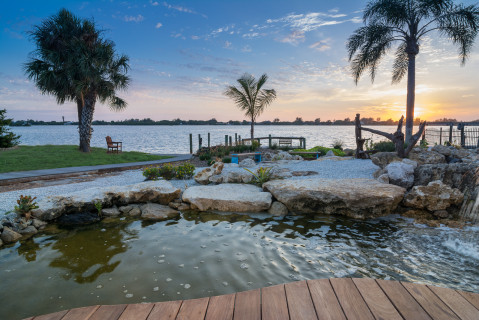 Bay view of Natural Florida Limestone Pond and Custom Pool in Osprey, Florida