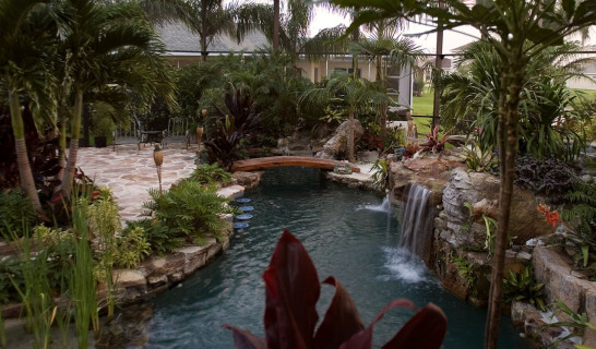 Overhead view of Lagoon Pool with Bar style seating, bridge and spa