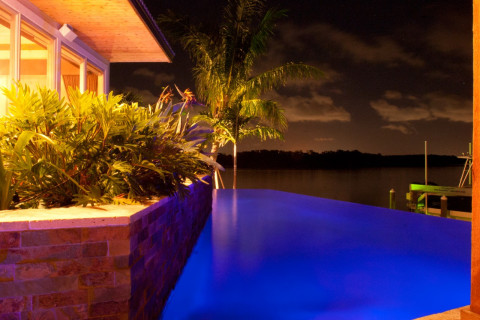 Infinity edge pool with modern planter