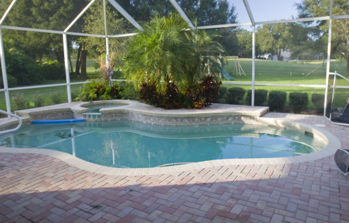 Lagoon Pool Remodel into Tropical Resort with Slide, Grotto and Stream Before