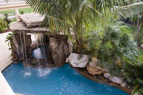 Lagoon Pool with Tall Grotto and Natural Stone Waterfall