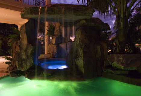 Lagoon Pool with Tall Grotto and Natural Stone Waterfall Swimming Pool Underwater Lighting