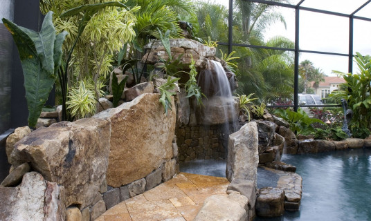 grotto-waterfall-travertine-stone-boulder-walk-into-spa_4643385654_o