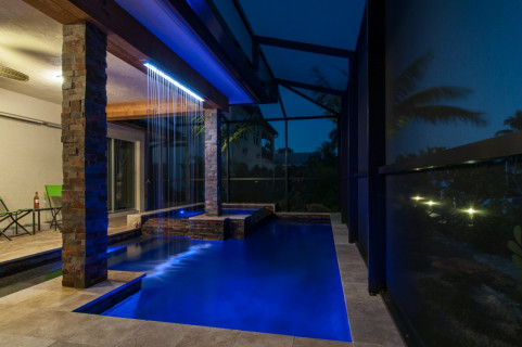 Rain curtain and modern swimming pool