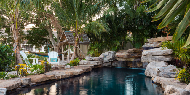 Grotto, seating, Tiki Hut and Hammock swinging in Coconut Palms