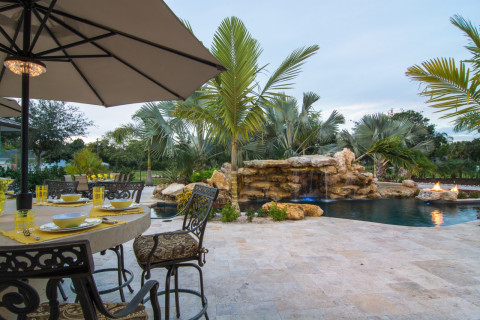 Natural Lagoon Pool with Bar and Outdoor Kitchen