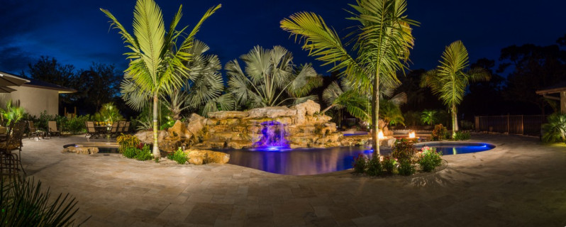 Night Panorama view of natural Lagoon Pool with rock waterfalls, pool waterfalls