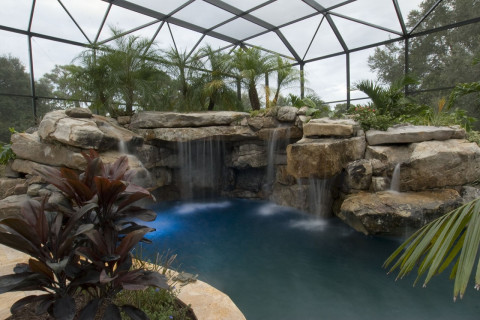 Waterfall view from travertine deck