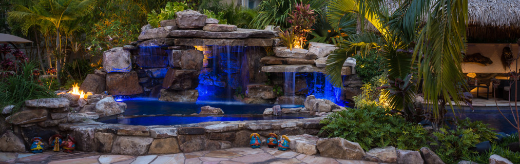 Natural rock waterfall pool Siesta Key custom pools with grotto