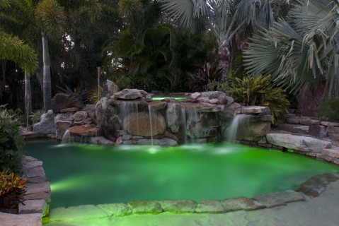 Natural Stone Grotto Waterfall with Elevated Spa Swimming Pool with Underwater Lighting