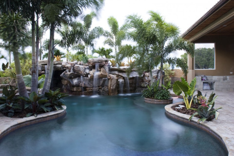 Shallow sundeck and lagoon pool with island planters