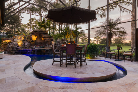 Sunset at the lagoon pool on a golf course