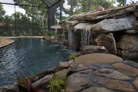 Pool Remodel with Stone Grotto Waterfall and Stone Spa