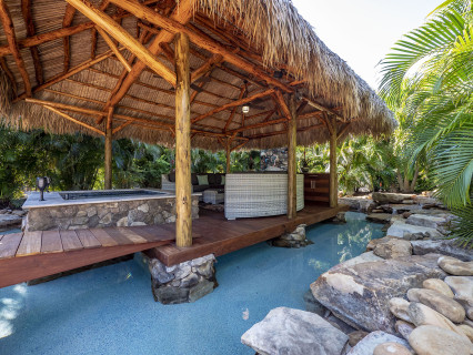 Outdoor Structure Image of timthumb.php?src=https%3A%2F%2Flucaslagoons.com%2Fwp content%2Fuploads%2Fsites%2F1%2Fnggallery%2Ftiki huts%2Fatiki.jpg&h=320&q=90&f= Picture of Tiki Hut Custom Built Pools