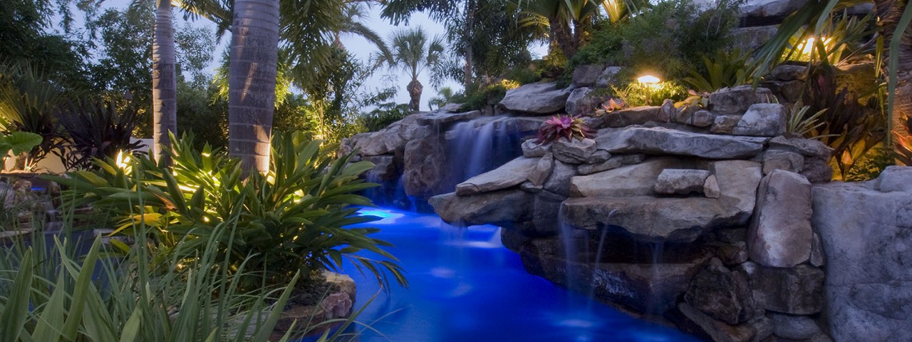 Massive Lagoon pool with grotto, planters and spa