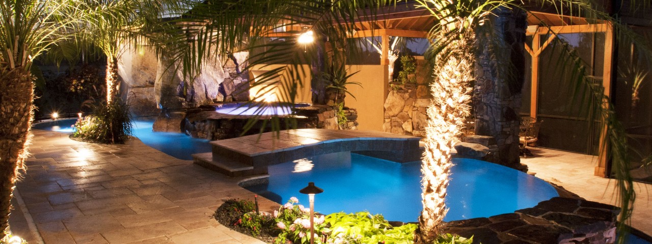 Image of Swimming Pool and Spa with Outdoor Kitchen, Bar and Waterfalls